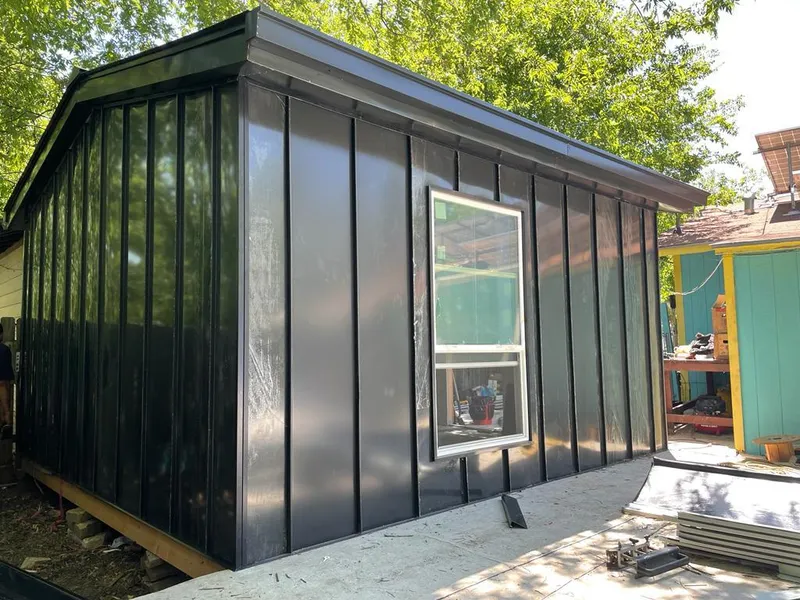 Black standing seam metal wall panels for Roof Inspection in Temple